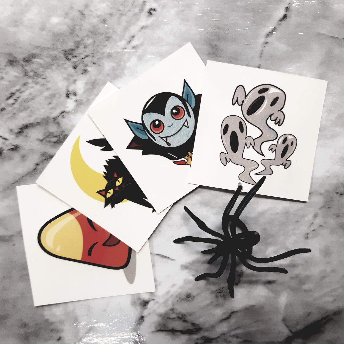 24 Piece Black Spider Ring Topper plus 24 Halloween Tattoos